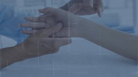 Animation of data processing over hands of caucasian male physiotherapist and female patient. Digital interface, data, healthcare, wellbeing and connection, digitally generated video. - Powered by Shutterstock - Get 15% off with code: PIKWIZARD15