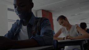 Animation of charts processing data over happy diverse students using tablets and laptops in class. Education, digital interface, data, learning, network and communication, digitally generated video. - Powered by Shutterstock - Get 15% off with code: PIKWIZARD15