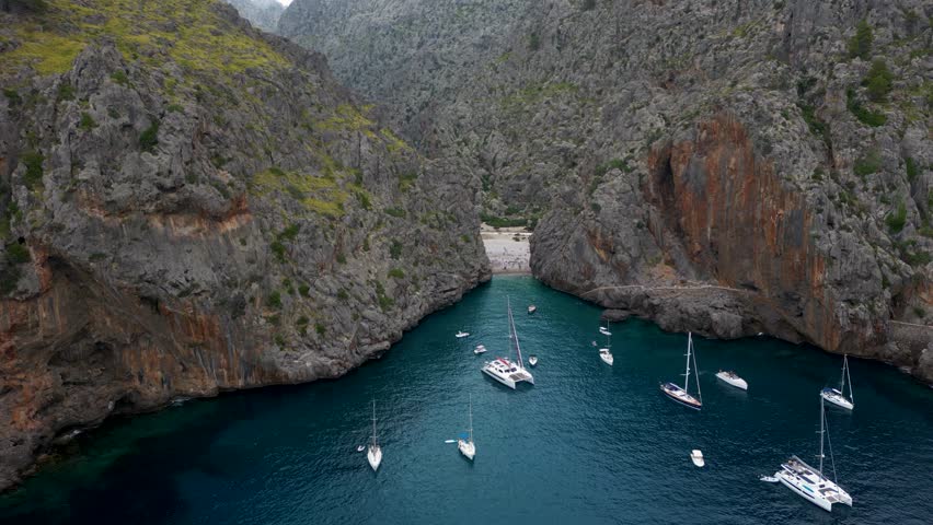 Beautiful blue water of Mediterranean Sea and massive cliffs, Mallorca, 4k