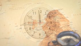 Animation of clock over world map with compass. Time, travel and digital interface concept digitally generated video. - Powered by Shutterstock - Get 15% off with code: PIKWIZARD15