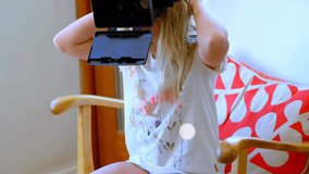 Animation of network of connections with icons over caucasian girl with vr headset. Global technology, connections, computing and data processing concept digitally generated video. - Powered by Shutterstock - Get 15% off with code: PIKWIZARD15