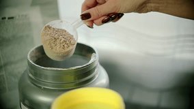 Dietary Supplements Protein Powder Into Shaker. Casein Protein. sport athlete bodybuilder trainer kitchen. dietary supplements. Healthy sports nutrition fitness bottle. Gainer, Protein Shake Creatine - Powered by Shutterstock - Get 15% off with code: PIKWIZARD15