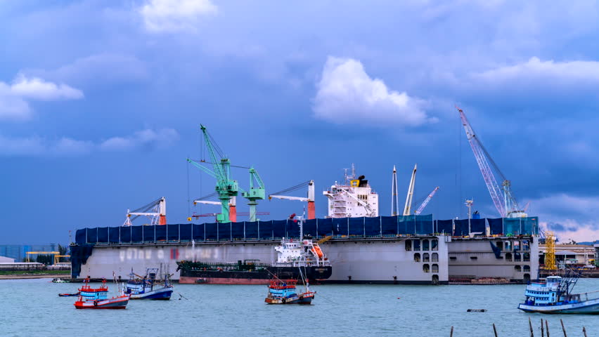 Timelapse of a large shipyard at sea