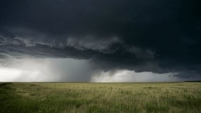 A heavy rainstorm engulfs the landscape, bringing dark, menacing skies and the looming threat of severe weather danger. - Powered by Shutterstock - Get 15% off with code: PIKWIZARD15