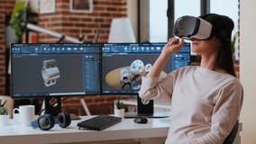 Asian woman engineer creating prototypes with vr glasses and 3D modeling software, working from home to develop new manufacturing gears and turbines. 3D design tech tools. Camera B. - Powered by Shutterstock - Get 15% off with code: PIKWIZARD15
