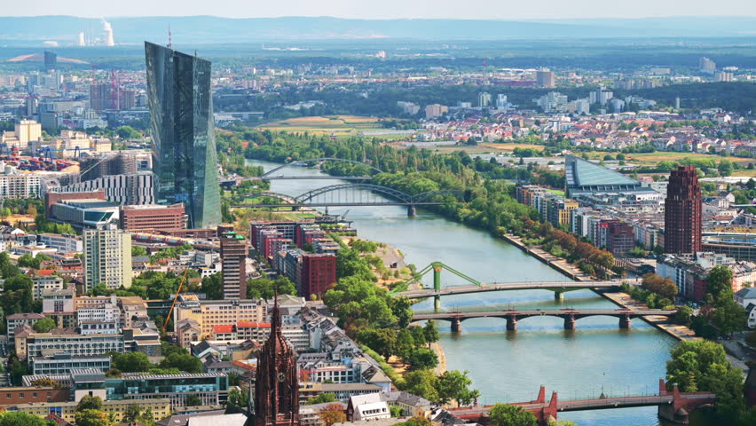 View of Frankfurt from a skyscraper, Germany. Multiple residential and office buildings, skyscrapers, Cathedral, river Main
