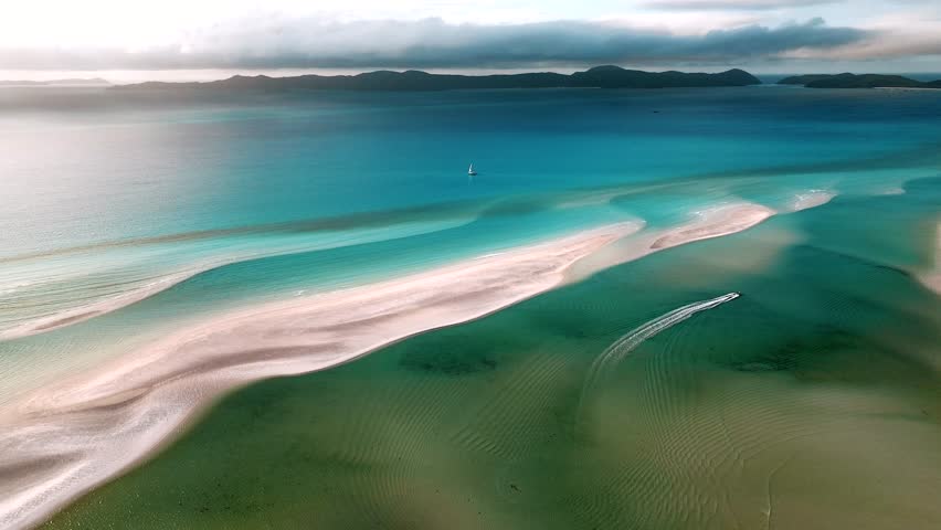 Aerial view of beautiful Whitehaven Beach with turquoise waters and serene sandbanks, Whitsundays, Australia.