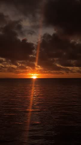 Orange sunrise over the Pacific ocean