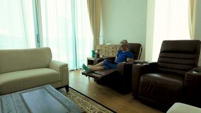 Senior woman reading from a tablet device in her downtown, city, apartment - Powered by Shutterstock - Get 15% off with code: PIKWIZARD15