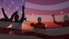 Animation of flag of america over happy diverse friends dancing with sparklers on sunset beach. American, summer, friendship, party, vacations, celebration and patriotism, digitally generated video. - Powered by Shutterstock - Get 15% off with code: PIKWIZARD15