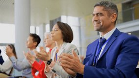 Animation of network of connections over diverse business people clapping hands in office. Global business and digital interface concept, digitally generated video. - Powered by Shutterstock - Get 15% off with code: PIKWIZARD15