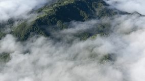 Sea of Clouds Aerial View - Spectacular Aerial View of the Sea of Clouds in Taiwan's Mountainous Regions during Autumn, Captured with a Drone. - Powered by Shutterstock - Get 15% off with code: PIKWIZARD15