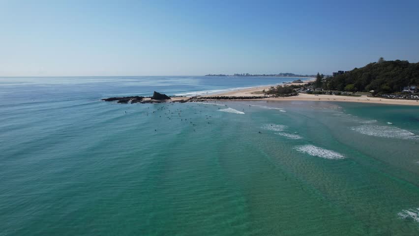 Surfers Near Currumbin Rock Scenic Spot In Gold Coast, Queensland, Australia. Aerial Drone Shot