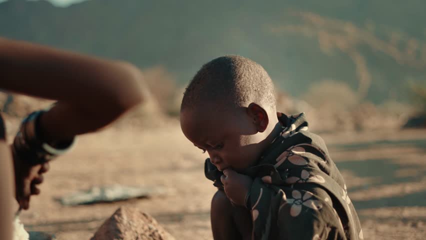 Namibia - 03 07 2024. Portrait of young poor african boy looking at camera, Africa 