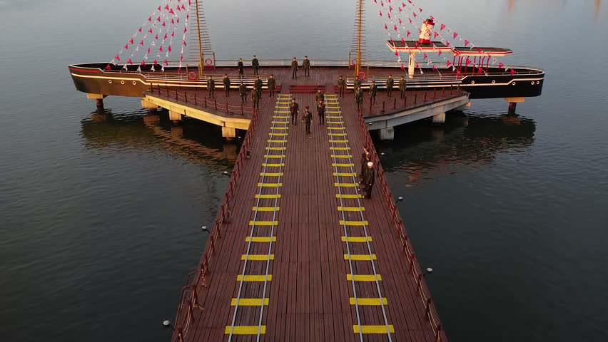 Samsun, Turkey - 12 October2024 Tobacco Pier is a pier where Mustafa Kemal Atatürk first stepped in to launch the Turkish War of Independence. Today, it is exhibited as wax sculptures. Sunset. Drone