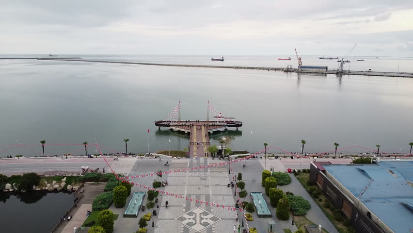 Samsun, Turkey - 12 October2024 Tobacco Pier is a pier where Mustafa Kemal Atatürk first stepped in to launch the Turkish War of Independence. Today, it is exhibited as wax sculptures. Sunset. Drone
