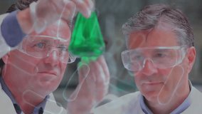 Animation of virus cells over caucasian male scientists working in lab. Science, medicine and pandemic concept digitally generated video. - Powered by Shutterstock - Get 15% off with code: PIKWIZARD15