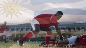 Animation of flag of uruguay over diverse male rugby players playing at stadium. Global sport and patriotism concept, digitally generated video. - Powered by Shutterstock - Get 15% off with code: PIKWIZARD15