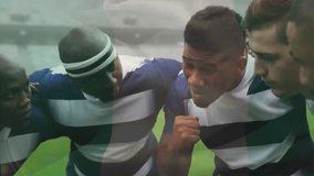 Animation of flag of nigeria over diverse male rugby players teaming up at stadium. Global sport and patriotism concept, digitally generated video. - Powered by Shutterstock - Get 15% off with code: PIKWIZARD15