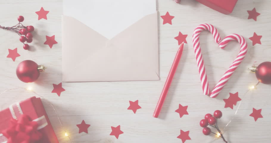 HO text animation over Christmas decorations with candy canes and gifts. festive, holiday, celebration, merry, winter, presents