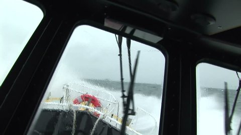 Pilot boat swaying in rough waters on the Columbia River, Oregon USA