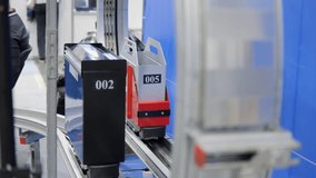 This text provides a brief glimpse into an automated cart system that effectively navigates through a warehouse - Powered by Shutterstock - Get 15% off with code: PIKWIZARD15