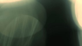 Slow motion real lens flare through glass effects for overlay or transition - Powered by Shutterstock - Get 15% off with code: PIKWIZARD15