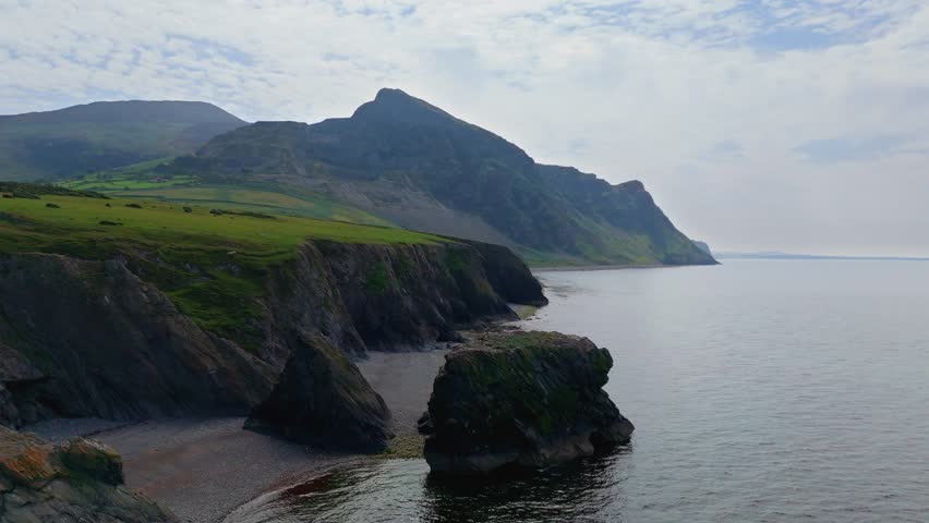 Trefor Sea Stacks, North Wales, Snowdonia: Cliffs, mountains (Gyrn Goch, Gyrn Ddu, Garn For), pebble beach, clear water, seabirds, and coastal scenery