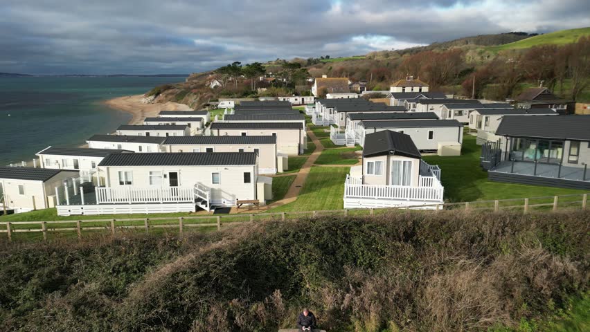 Aerial drone video of a holiday home park on the Dorset coastline.