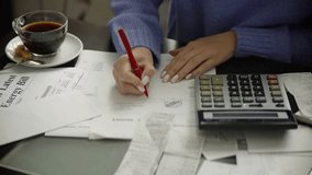 Family Tax Bill Debt Overspend. High Tax. Paying bills through on-line application using laptop,sorting out domestic, household papers. Planning family expenses manage budget, doing paperwork at home - Powered by Shutterstock - Get 15% off with code: PIKWIZARD15