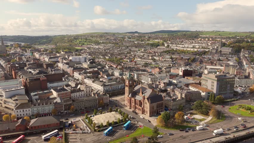 City of Derry aka Londonderry in Northern Ireland aerial view - A Beautiful Cityscape from above by the River Foyle Featuring the Beautiful Pedestrian Peace Bridge