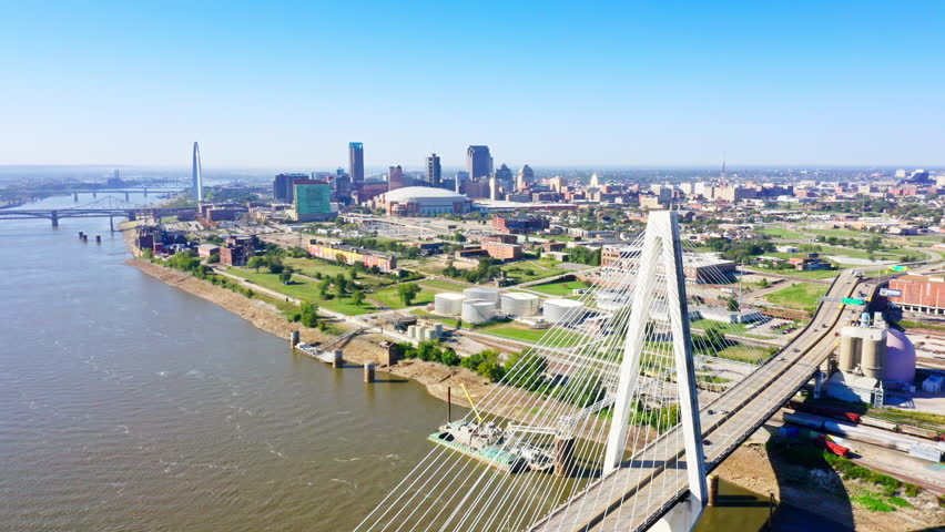 Aerial view of St Louis, Missouri with slow camera pull-back above Stan Musial Memorial Bridge. St. Louis is an independent city in the U.S. state of Missouri.