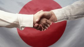 Japanese Man Woman Business Partners Shaking Hands. Handshake, Make A Deal,Japan - Powered by Shutterstock - Get 15% off with code: PIKWIZARD15