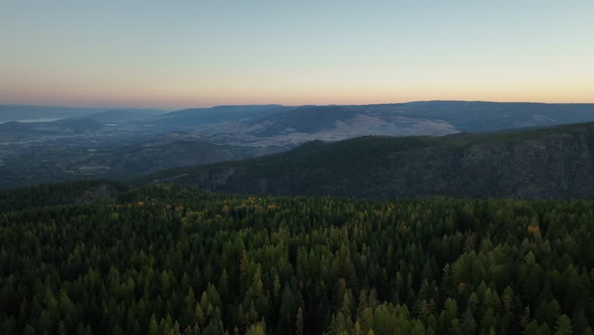 An aerial view of Myra Canyon Trestles during Sunrise in Kelowna, Myra-Bellevue Park, British Columbia, Canada