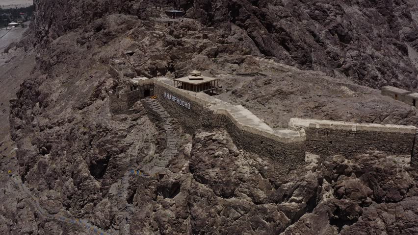 An aerial footage of the walls of Kharphocho Fort on a rocky mountain, in Skardu, Pakistan