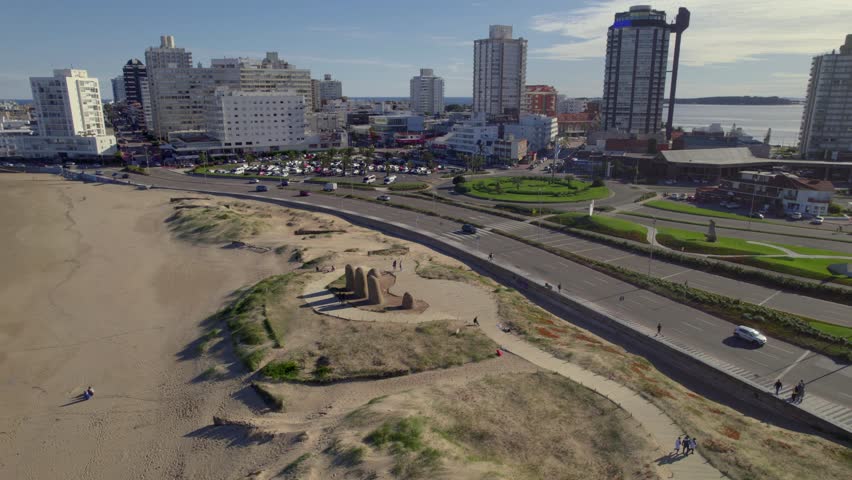 An aerial footage of the Fingers of Punta del Este (Los Dedos de Punta del Este) on Brava Beach on a sunny day in Punta del Este, Maldonado, Uruguay