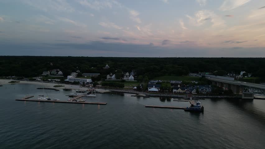 An aerial footage of the Yorktown Beach and Yorktown Fishing Pier at sunset in Virginia, United States