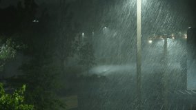 Hurricane Helene Strikes City With Strong Wind and Torrential Rain. Tropical Storm Helene South Carolina Greenville. Heavy Rain at Night on Street With Street Lights and Cars. Extreme Weather Events. - Powered by Shutterstock - Get 15% off with code: PIKWIZARD15