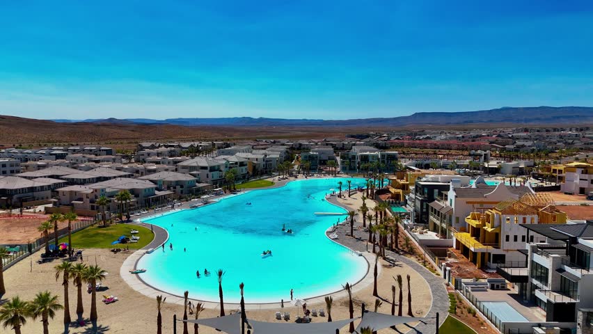An ascending aerial footage of the Desert Color neighborhood on a sunny day in St. George city, Utah, USA