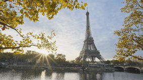 Beautiful view of famous Eiffel Tower one of the most iconic landmarks in France. Paris city center and river Seine at morning sunrise or sunset in autumn. Best travel destinations landmark in Europe. - Powered by Shutterstock - Get 15% off with code: PIKWIZARD15