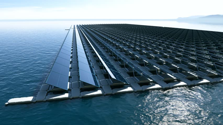 Wide-angle view of a large floating solar panel array on calm water. The setup covers a vast area, harnessing solar energy efficiently. Clear sunny skies enhance the scene's clean and modern aesthetic