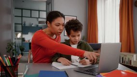 African American family at home education mother mom female woman girl helping studying son help learning online task internet class laptop study together kid child boy discuss exercise learn teaching - Powered by Shutterstock - Get 15% off with code: PIKWIZARD15