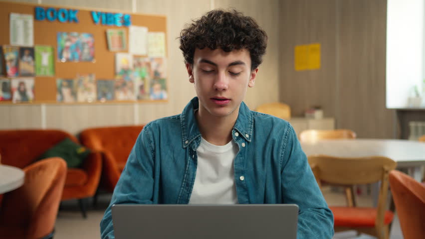 Caucasian male student guy pupil boy teen teenager studying laptop learning computer using pc study learn online education internet course homework prepare to exams school academy college university - Powered by Shutterstock - Get 15% off with code: PIKWIZARD15