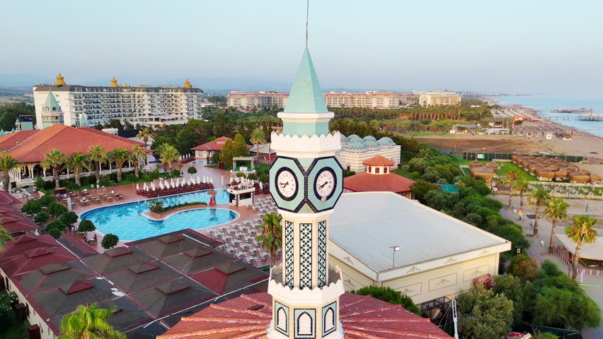 Evening Time at Turkish Style Clock Tower Surrounded by Sea and Scenic Landscape