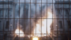 Dark Silhouette Behind Metal Fence Haunting Urban Night Scene Mysterious Dramatic - Powered by Shutterstock - Get 15% off with code: PIKWIZARD15