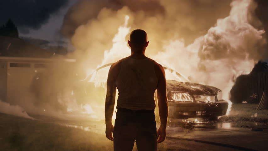 Silhouetted Man Watching Car Explosion Dark Night Dramatic Scene Cinematic Moment