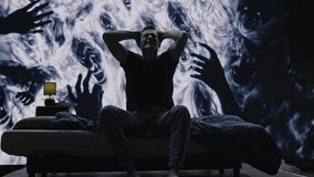 Haunting Nightmare Scene Person On Bed With Ghostly Hands Dark Horror Paranormal - Powered by Shutterstock - Get 15% off with code: PIKWIZARD15