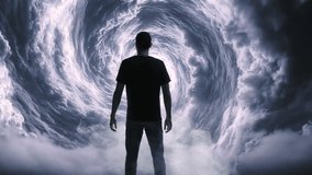 Silhouette Of Man Looking Up Into Dramatic Spiral Cloud Formation Spiritual Journey Contemplation - Powered by Shutterstock - Get 15% off with code: PIKWIZARD15