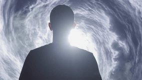 Silhouette Man Standing In Mystical Storm Cloud Portal Spiritual Journey Transformation Enlightenment - Powered by Shutterstock - Get 15% off with code: PIKWIZARD15