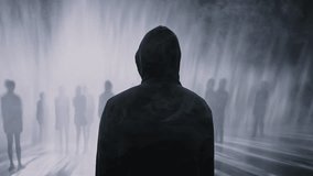 Mysterious Hooded Man Faces Ethereal Crowd In Foggy Dystopian Social Commentary Dark Atmospheric - Powered by Shutterstock - Get 15% off with code: PIKWIZARD15